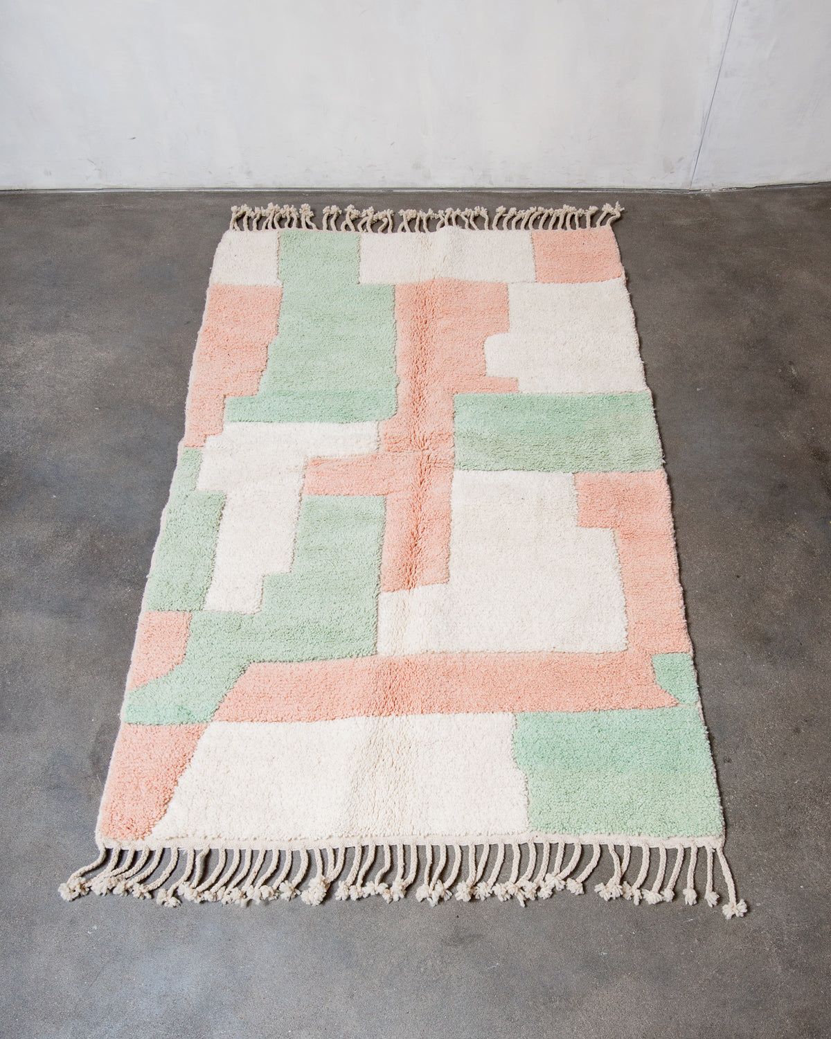 Modern, designer, handcrafted Berber rug from Morocco. Beniourain carpet with beautiful colours and patterns and fluffy wool texture.